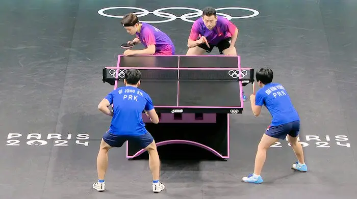 RI Jong Sik and KIM Kum Yong (North Korea) beat WONG Chun Ting and DOO Hoi Kem (Hong Kong China)